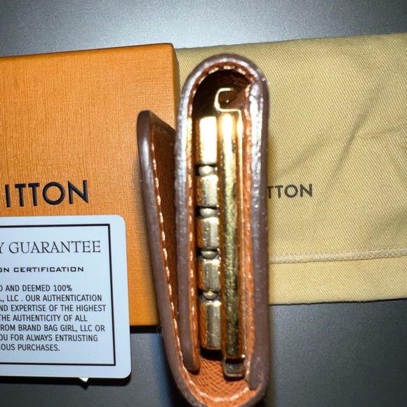 Authentic Louis Vuitton 4 key holder w/ authentication card. - Picture 5 of 10